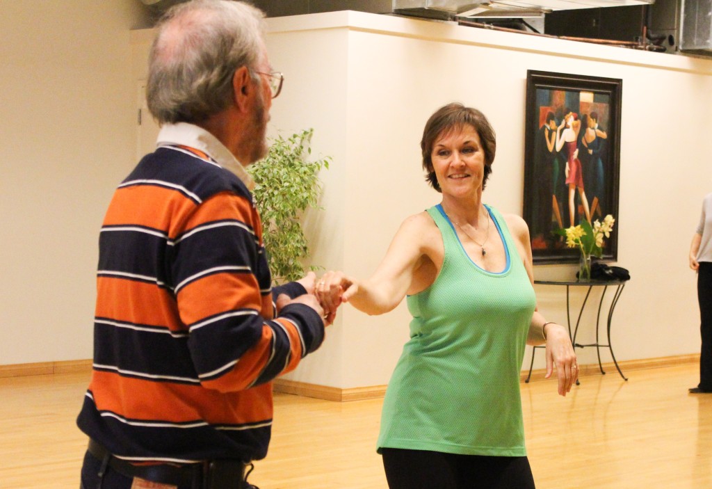 Two dance enthusiasts continued rehearsing after the class ended. AT this time, they knew the steps well and they could dance along with the music.