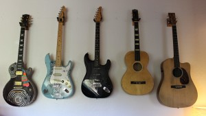 FMLYBND's guitar wall.