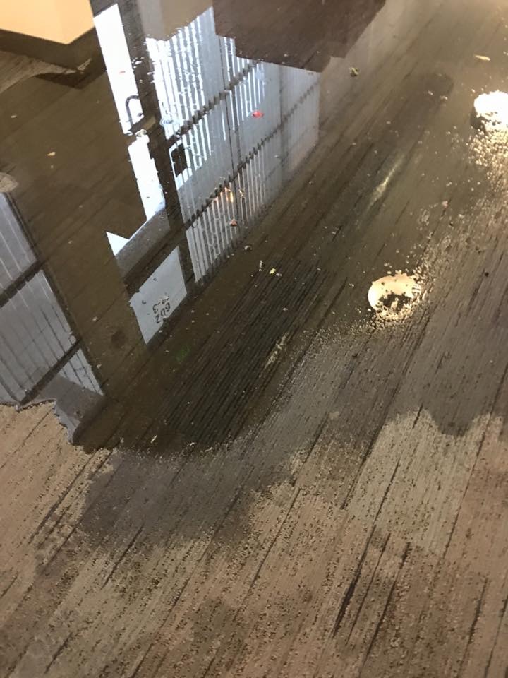 Flooding into hallways at Antioch.- A photo from Johni Hull 
