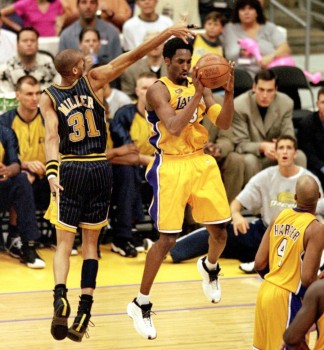 Reggie Miller attemping to block Kobe's jumper