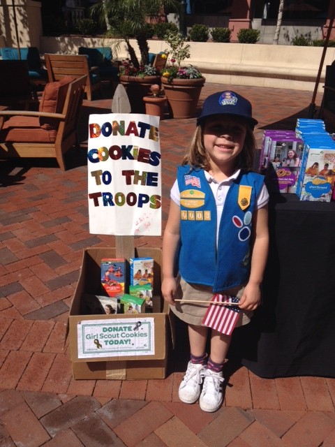 "Girl Scouts collect cookies for Soldiers!" Picture by Erin Maloney