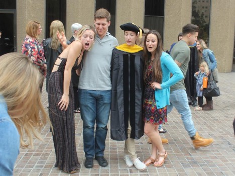 It's not often that my siblings and I can all get together for a photo, but my older sister getting her doctorate in Psychology was clearly reason to celebrate. Here you'll see my brother throwing his sunglasses on the floor, photo in mind, while my sisters and I clearly fear for the life of his favorite accessory. -Autumn Vandiver