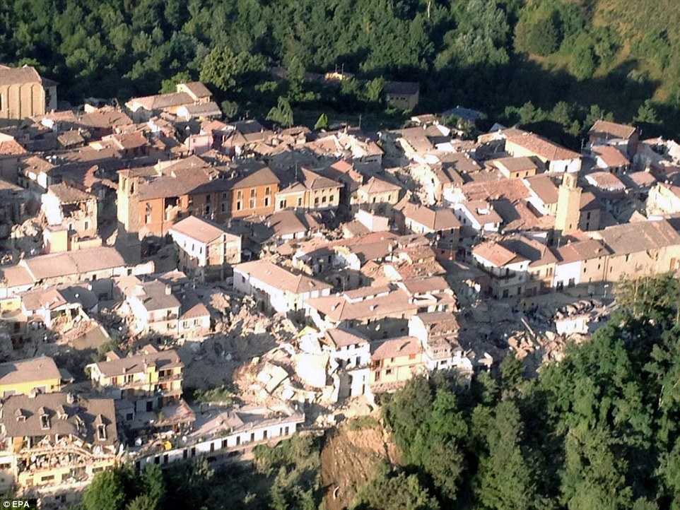 An aerial photograph from the Italian Fire Brigade shows the collapsed and damaged houses in Amatrice - Daily Mail AP 